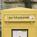 a yellow box with writing on the side of it