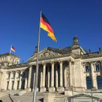 Germany flag on pole near building during day