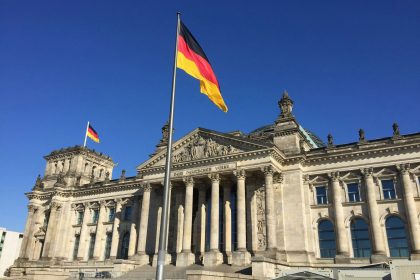 Germany flag on pole near building during day