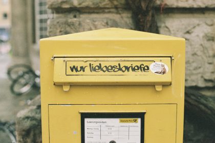 a yellow box with writing on the side of it