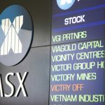 a wall that has a bunch of signs on it