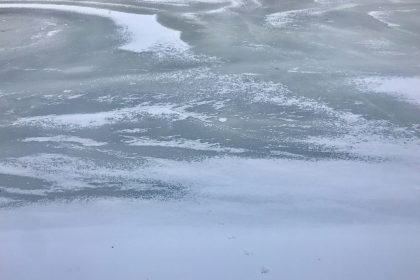 a view of the ice from an airplane window