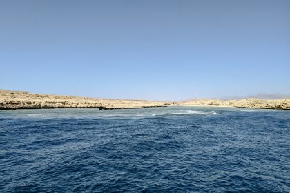 a body of water next to the ocean