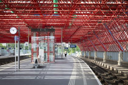 Red structural railway station.