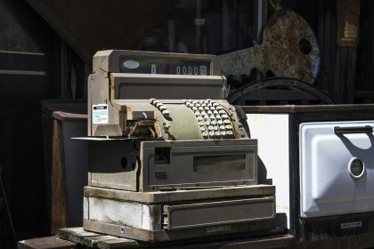 an old typewriter sitting on top of a table