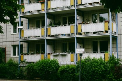 an apartment building with balconies and balconies on the balconies