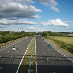 a highway with cars on it