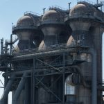 a large industrial building with a lot of pipes