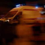 white van on road during night time