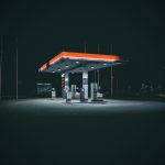 a gas station at night with no people around
