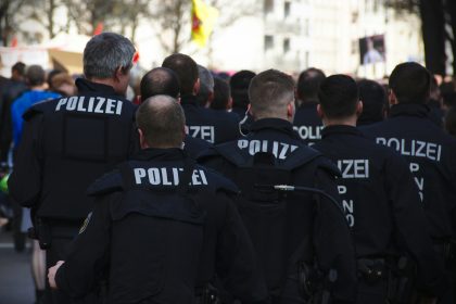 police standing on road during daytime