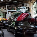 assorted-color vehicles inside building